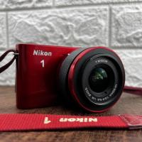 Nikon 1 J1 Crimson with accessories Nikon 1 J1 Crimson with accessories